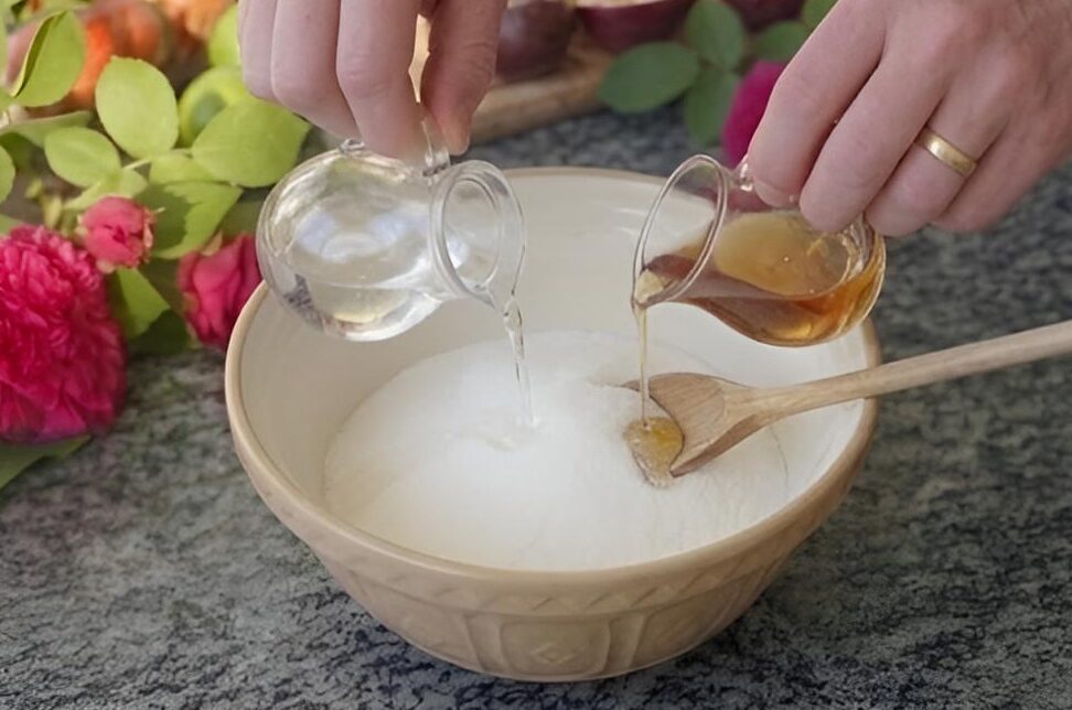 Mélange du sucre avec le sirop de glucose et l'eau - Recette sucettes à la rose - ©Roses Guillot®